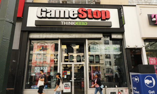 NEW YORK, NEW YORK - SEPTEMBER 16: People pass a GameStop store in lower Manhattan on September 16,...