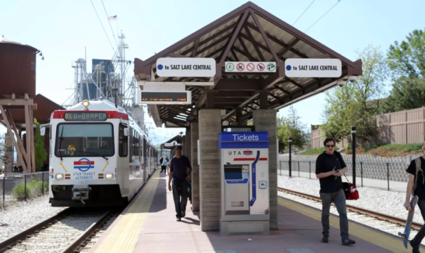Travelers get off a TRAX train at the Draper Town Center stop in Draper on Wednesday, May 10, 2017....