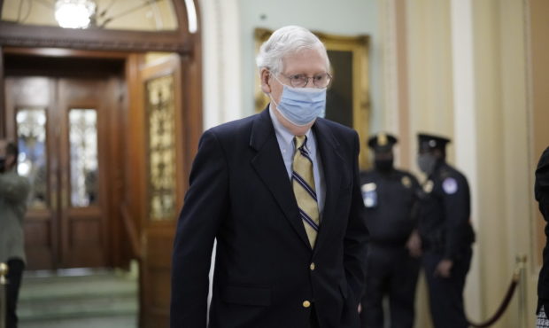Senate Minority Leader Mitch McConnell of Kentucky, walks in the Capitol as the Senate convenes in ...