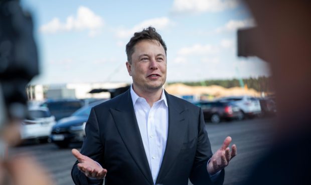 Tesla head Elon Musk talks to the press as he arrives to to have a look at the construction site of...