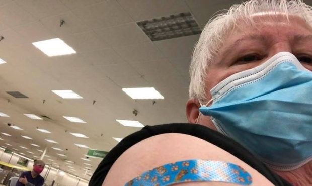 Orem resident Marj Eldard Vaccine utah countyshows off her band-aid after getting a COVID-19 vaccin...