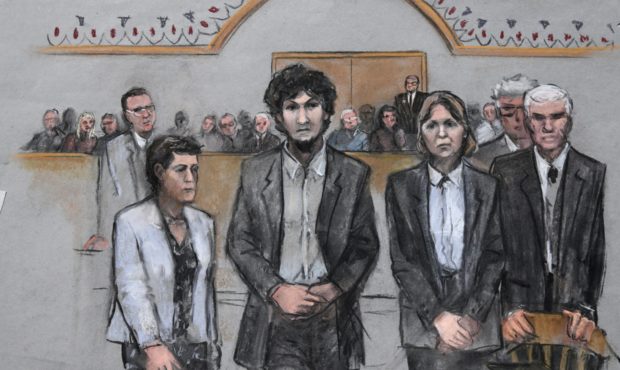 FILE - In this May 15, 2015 courtroom sketch, Boston Marathon bomber Dzhokhar Tsarnaev, center, sta...