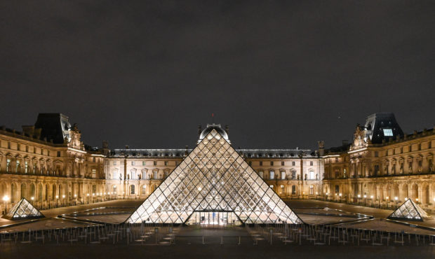 PARIS, FRANCE - NOVEMBER 07: Elevated night view of the illuminated Louvre Pyramid and Louvre Museu...