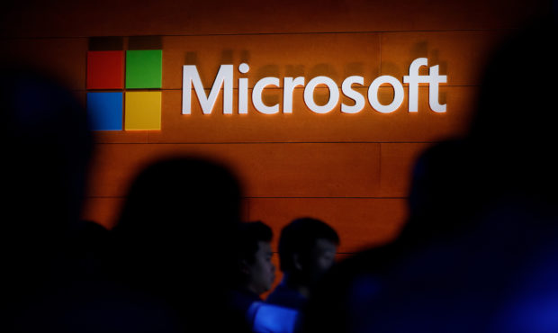 NEW YORK, NY - MAY 2: The Microsoft logo is illuminated on a wall during a Microsoft launch event t...