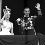 FILE - In this June 2, 1953 file photo, Britain's Queen Elizabeth II and her husband, the Duke of Edinburgh, wave from the balcony of Buckingham Palace, London, following the Queen's coronation at Westminster Abbey. Buckingham Palace says Prince Philip, husband of Queen Elizabeth II, has died aged 99. (AP Photo/Leslie Priest, File)