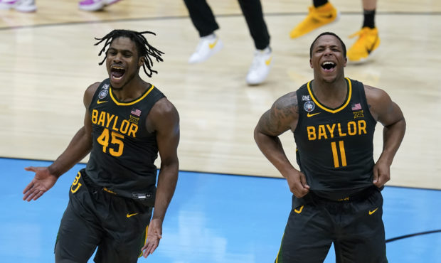 Baylor guard Davion Mitchell (45) and Baylor guard Mark Vital (11) celebrate at the end of the cham...