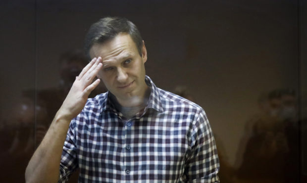 FILE - In this Saturday, Feb. 20, 2021 file photo, Russian opposition leader Alexei Navalny stands ...