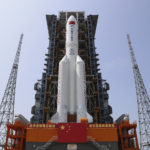 In this photo released by Xinhua News Agency, the core module of China's space station, Tianhe, on the the Long March-5B Y2 rocket is moved to the launching area of the Wenchang Spacecraft Launch Site in southern China's Hainan Province on April 23, 2021. China plans to launch the core module for its first permanent space station this week in the latest big step forward for the country’s space exploration program. The Tianhe, or “Heavenly Harmony”  module is set to be hurtled into space aboard a Long March 5B rocket from the Wenchang Launch Center on the southern island of Hainan. The launch could come as early as Thursday night, April 29, 2021 if all goes as planned.  (Guo Wenbin/Xinhua via AP)