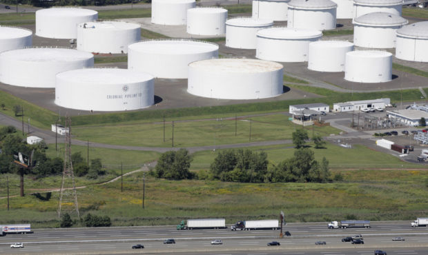 FILE - In this Sept. 8, 2008 file photo traffic on I-95 passes oil storage tanks owned by the Colon...