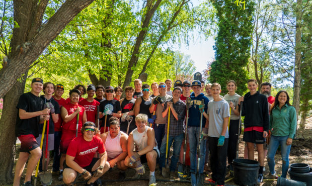 Students from American Fork High School gathered to begin work on a project to create a healing gro...