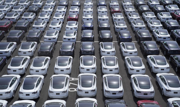 Tesla Inc. vehicles in a parking lot after arriving at a port in Yokohama, Japan, on Monday, May 10...