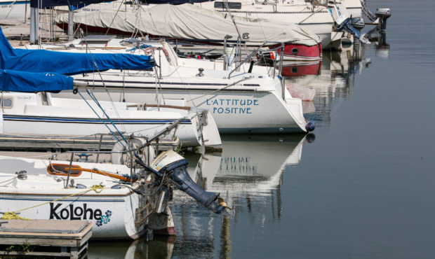 Boats are reflected in the water at Utah Lake's Lindon Marina in Vineyard on Monday, Aug. 24, 2020....