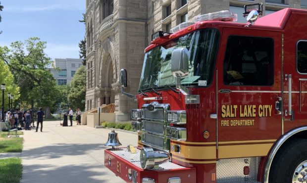 A Salt Lake City Fire Department engine parked next to the Salt Lake City and Council Building.    ...