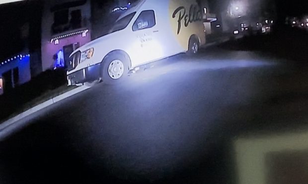 (A freezeframe of Herriman police body-cam video, which shows Isaac Christensen hiding under a van....