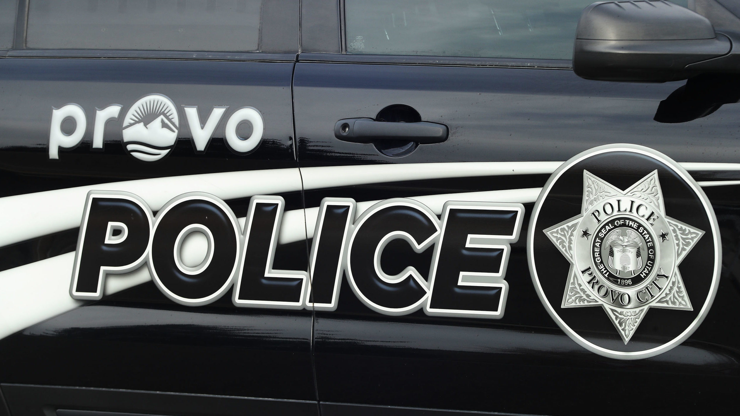 Provo Police car pictured, they are investigating a crash on state street...