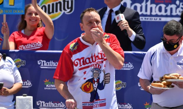 Joey Chestnut beat his own world record to win the hot dog eating contest for a 14th time in 15 yea...