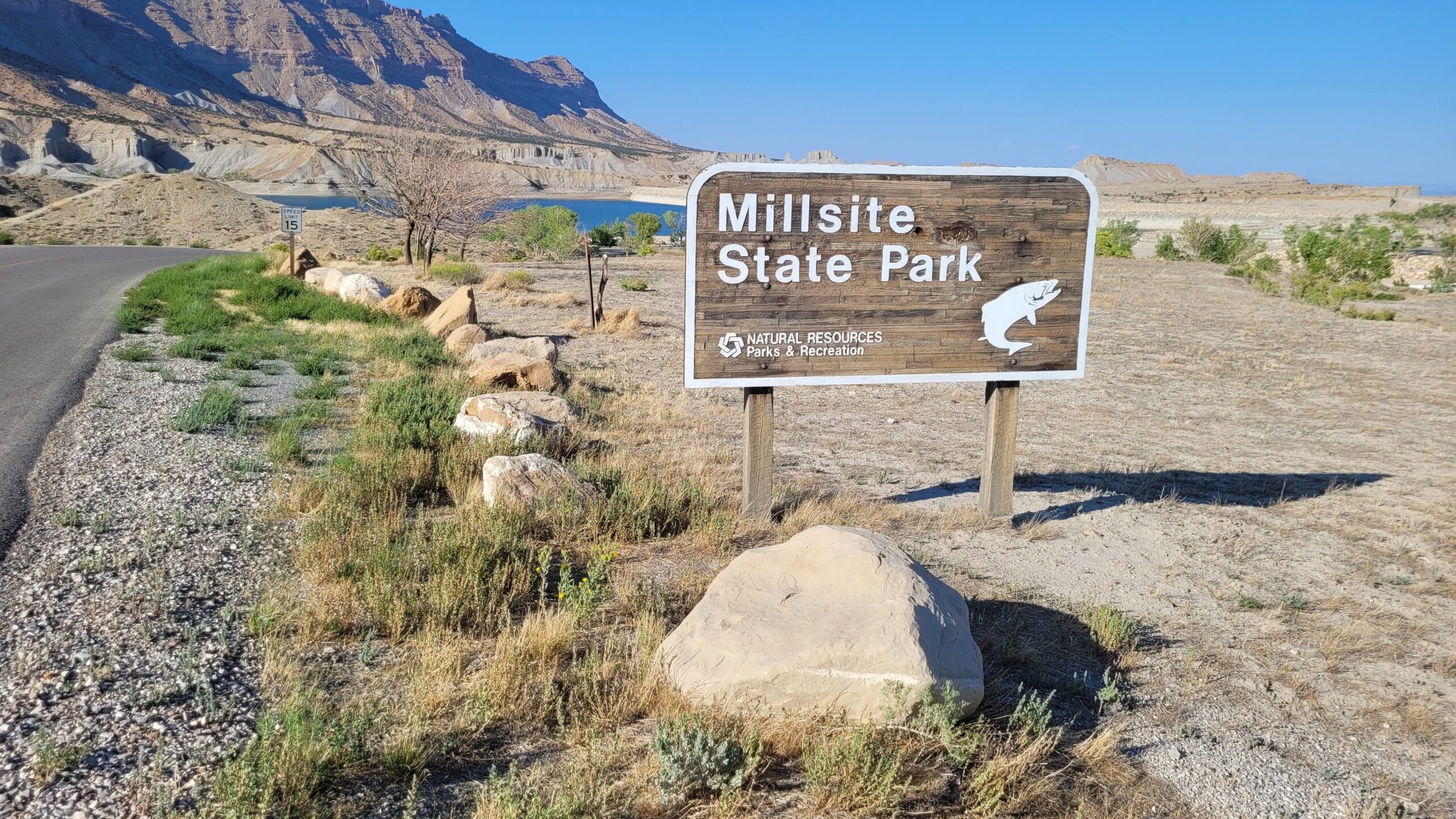 millsite state park sign shown, bucket biologists maybe threaten wildlife in the reservoir...