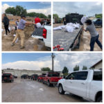 (Pictured above, two of dozens of volunteers filling sandbags then loading them onto trucks.  Pictured below, the line of vehicles hauling sandbags wrapped around the water tower in Delta.  Photo: Paul Nelson)