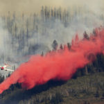 FILE: An air tanker drops retardant on the Parleys Canyon west of Park City on Saturday, Aug. 14, 2021. (Scott G. Winterton/Deseret News)
