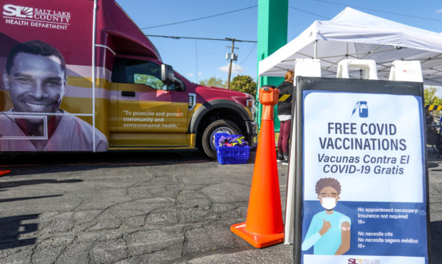 FILE -- Utahns walk up to get a COVID-19 vaccinate at a pop-up vaccination event at Reams in Magna ...