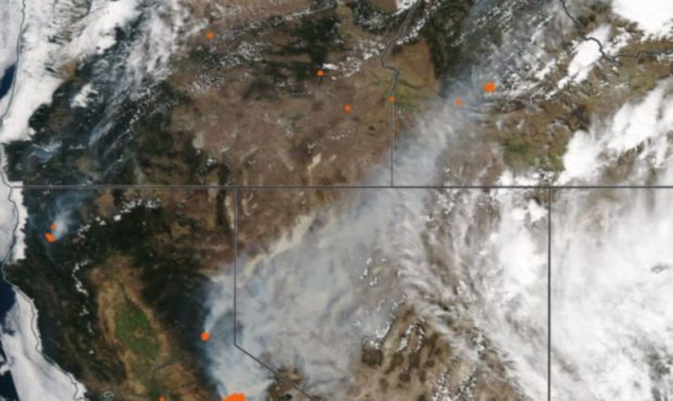 A NASA satellite image of the 2013 Yosemite Rim Fire, one of California's largest fires. The image ...