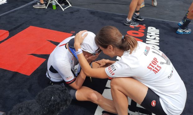 Kyle Brown collapses after finishing the IronMan 70.3 World Championships at St. George (Lindsay Ae...