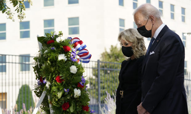 President Joe Biden and first lady Jill Biden participate in a wreath ceremony on the 20th annivers...