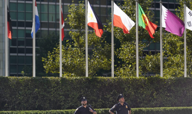 Police officers stand in front of United Nations headquarters in New York, Monday, Sept. 20, 2021. ...