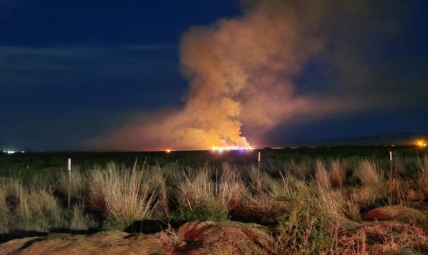 A five acre flare-up burns on Wednesday September 28, 2021 in the wetlands west of Farmington. 

Co...