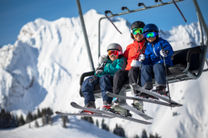 family on chair lift at Alta Ski Resort in Utah