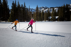 two people learn how to cross-country ski in Utah