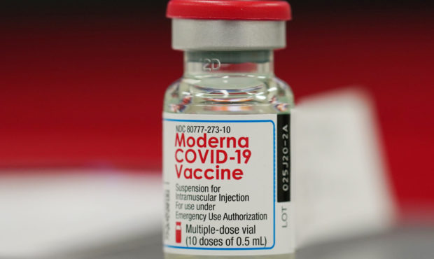 FILE - This Wednesday, Dec. 23, 2020 file photo shows a vial of the Moderna COVID-19 vaccine in the...