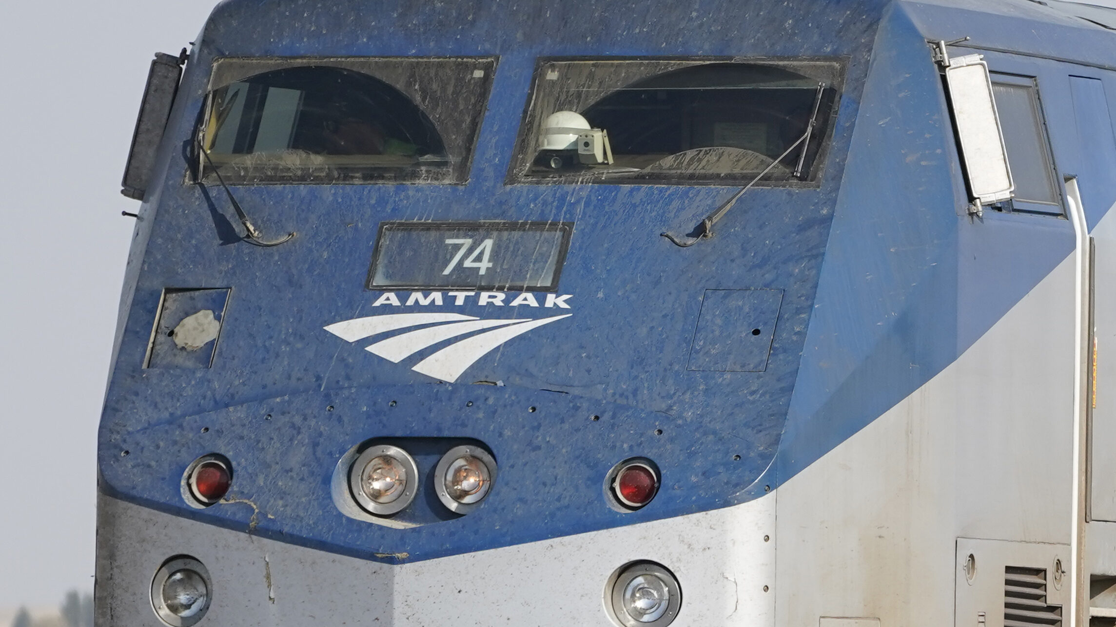 The front windows of an Amtrak train engine are shown, Monday, Sept. 27, 2021. The Federal Railroad...
