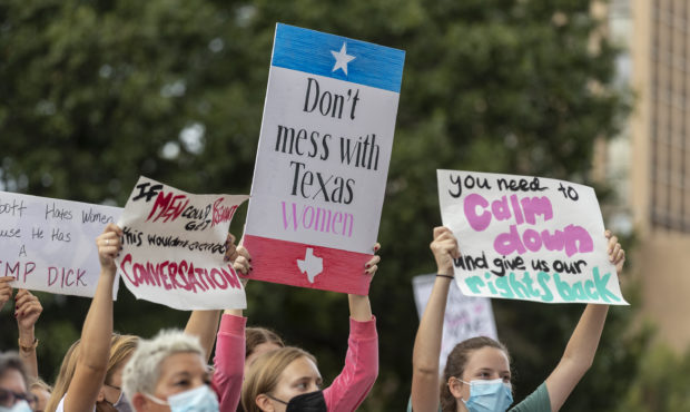 FILE - In this Oct. 2, 2021, file photo, people attend the Women's March ATX rally, at the Texas St...