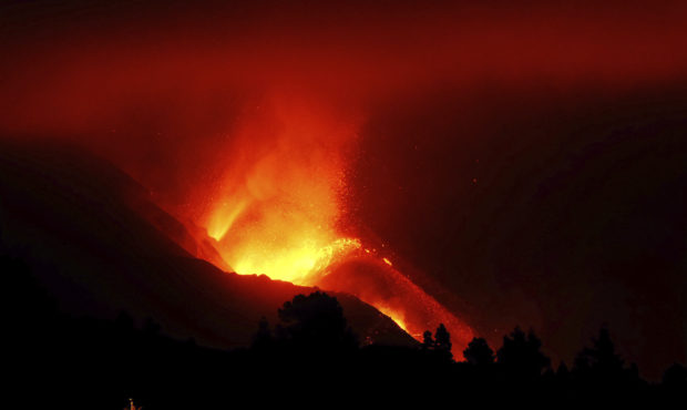 A  view of the volcano continues to spew out lava on the Canary island of La Palma, Spain in the ea...