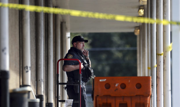 Memphis Police Department officers work the scene of a post office after a shooting, Tuesday, Oct. ...