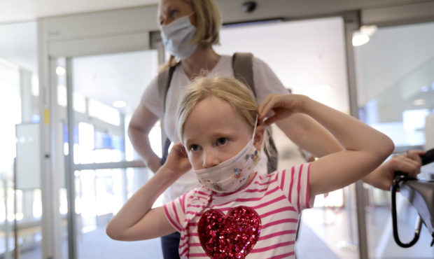 FILE PHOTO: Adelaide Skene puts on a face mask at Intermountain Medical Center in Murray on Tuesday...