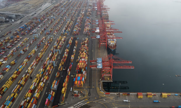SAN PEDRO, CALIFORNIA - OCTOBER 23: Aerial view of containers and ships at the Port of Los Angeles ...