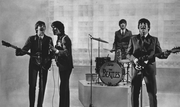 FILE - The Beatles are seen performing, date unknown. From left to right: Paul McCartney, George Ha...