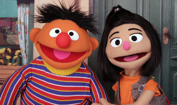 Ernie, a muppet from the popular children's series "Sesame Street," appears with new character Ji-Y...
