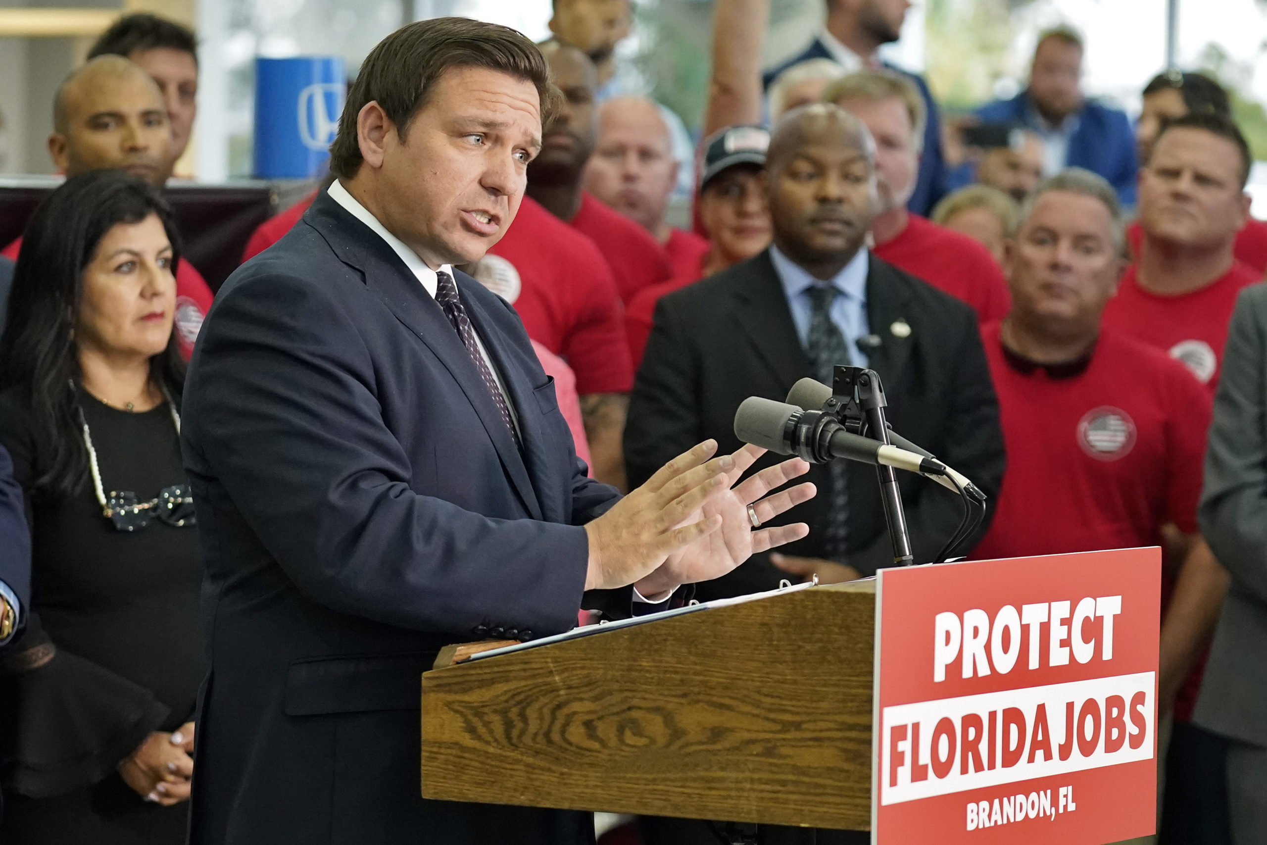 Florida Gov. Ron DeSantis speaks to supporters and members of the media before a bill signing Thurs...
