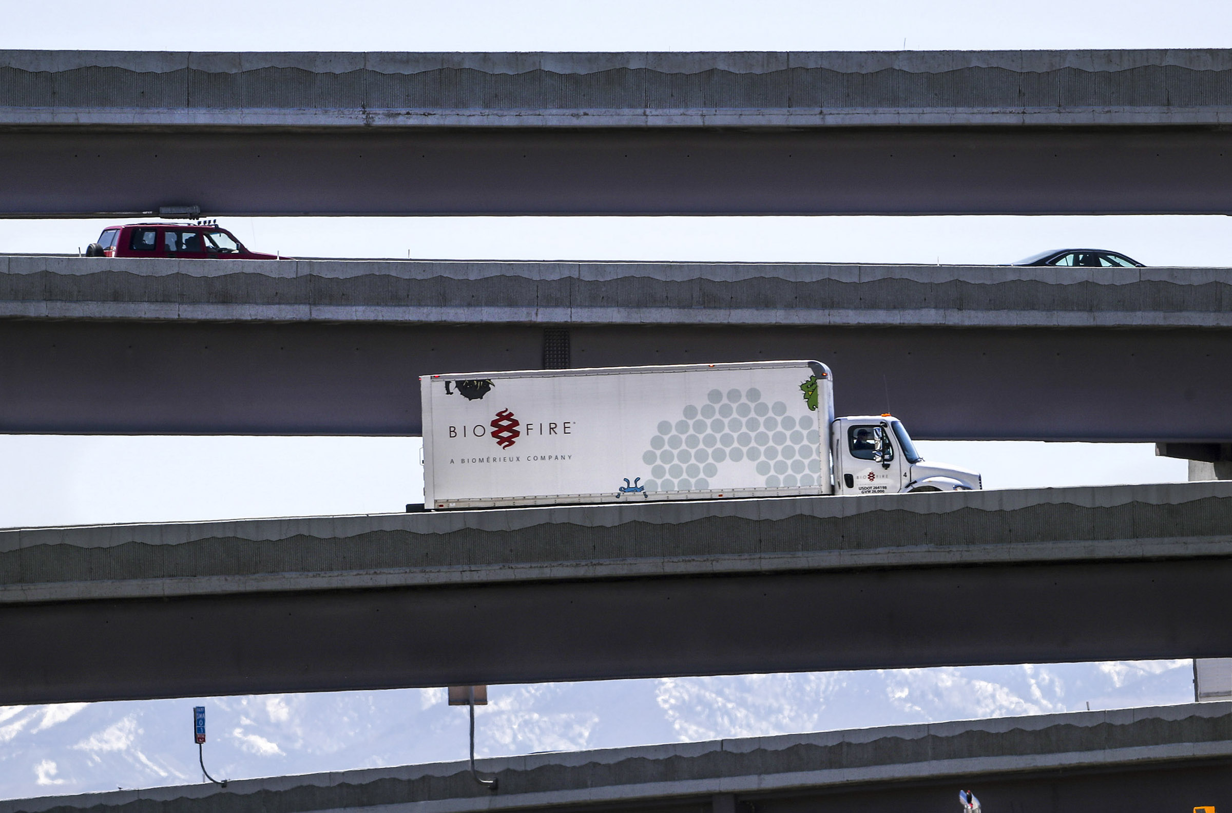 Traffic flows along the overpasses at the I-80 and I-15 interchange in South Salt Lake on Wednesday...