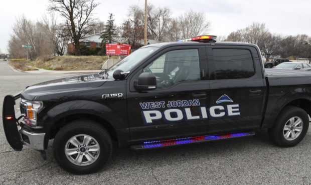 west jordan police truck, officers are being sued over alleged naked wrongful arrest...