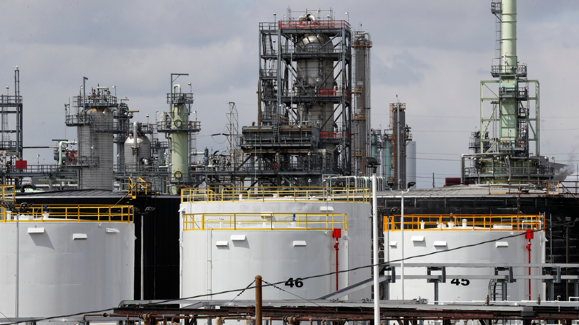Storage tanks are shown at a refinery in Detroit, Tuesday, April 21, 2020. The White House on Tuesd...