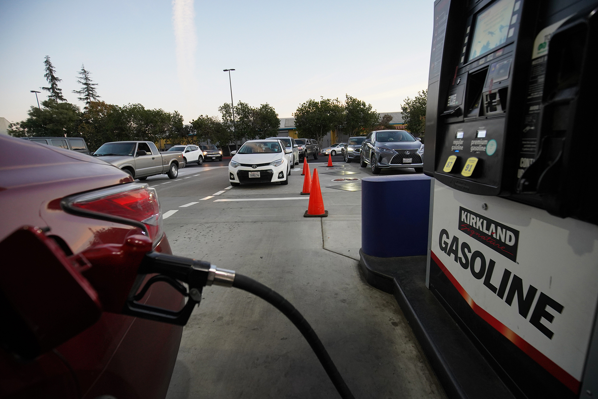 SAN LEANDRO, UNITED STATES - 2021/10/16: A driver pumps gas at a gas station of Costco in Californi...