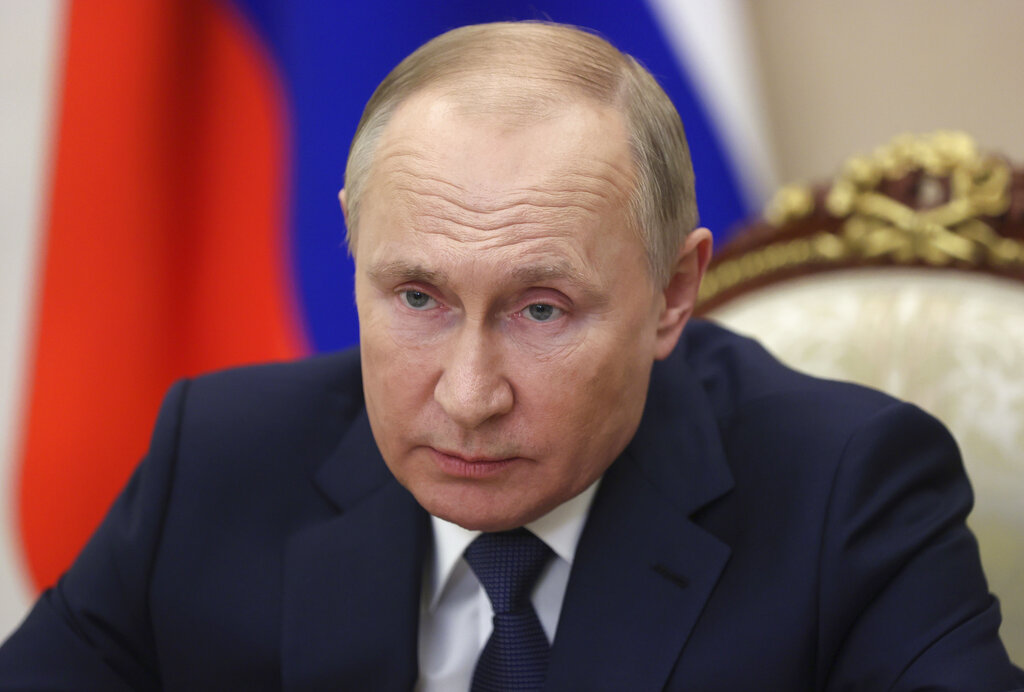 Russian President Vladimir Putin holds a video conference to address participants in a congress of ...
