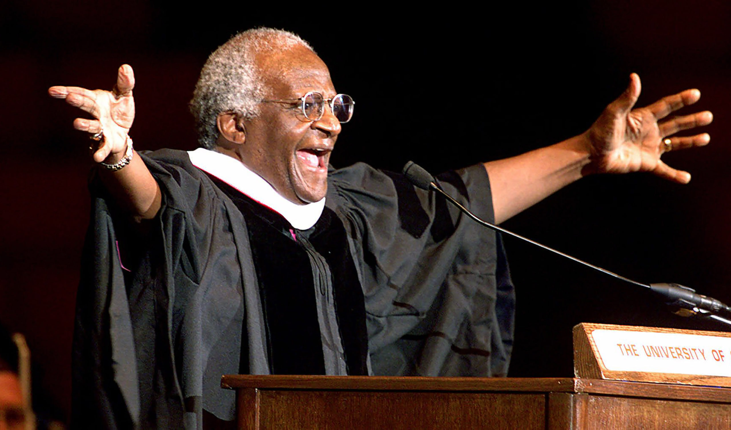 FILE - Archbishop Emeritus Desmond Tutu addresses new University of Oklahoma graduates, at a ceremo...