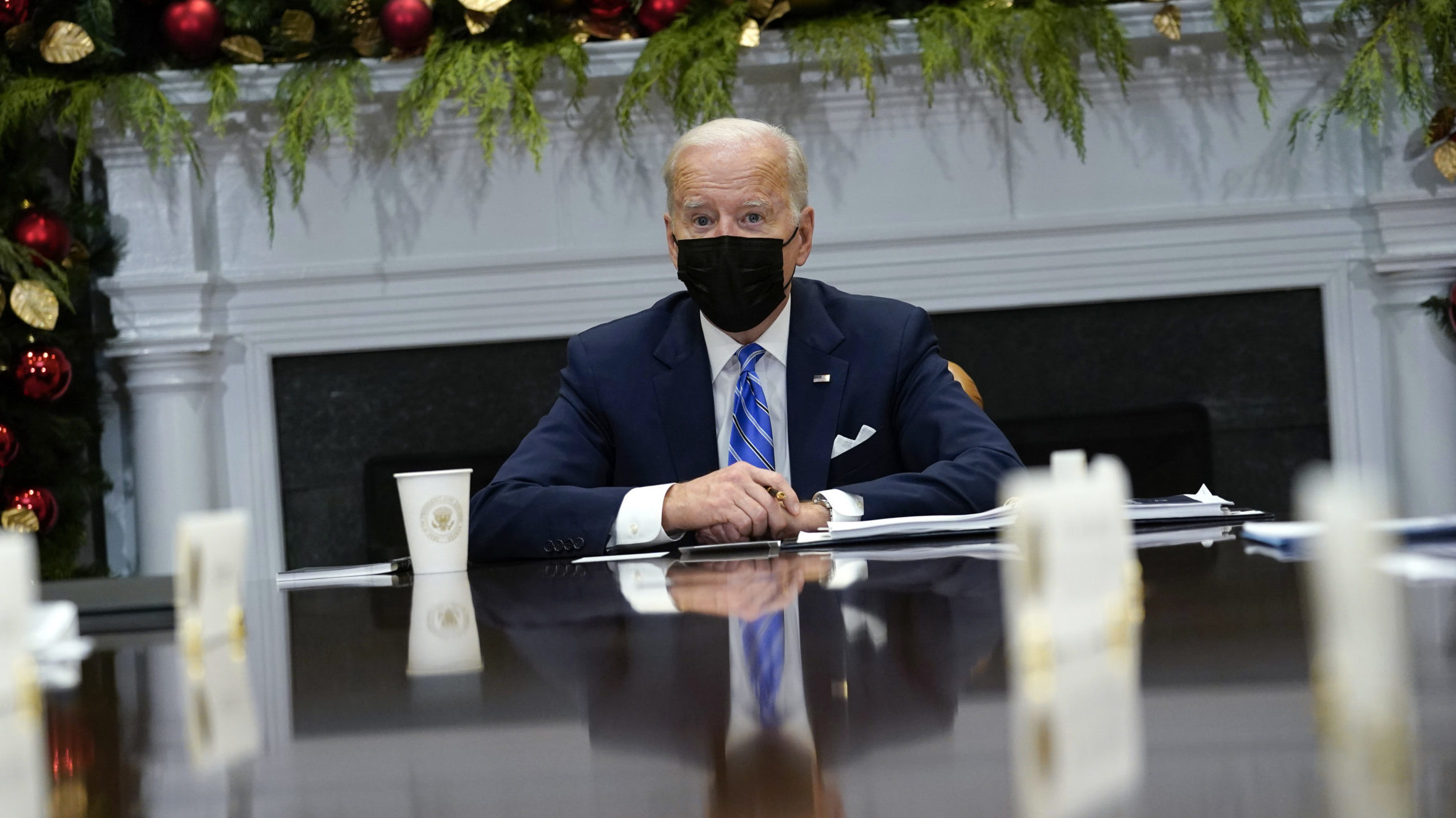 FILE: President Joe Biden speaks as he meets with members of the White House COVID-19 Response Team...