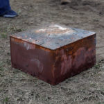 Workers recover a box believed to be the 1887 time capsule that was put under Confederate Gen. Robert E. Lee's statue pedestal in Richmond, Va., Monday, Dec. 27, 2021. Crews wrapping up the removal Monday of the giant pedestal that once held a statue of Confederate Gen. Lee found what appeared to be a second and long-sought-after time capsule, Virginia Gov. Ralph Northam said. (Eva Russo/Richmond Times-Dispatch via AP)