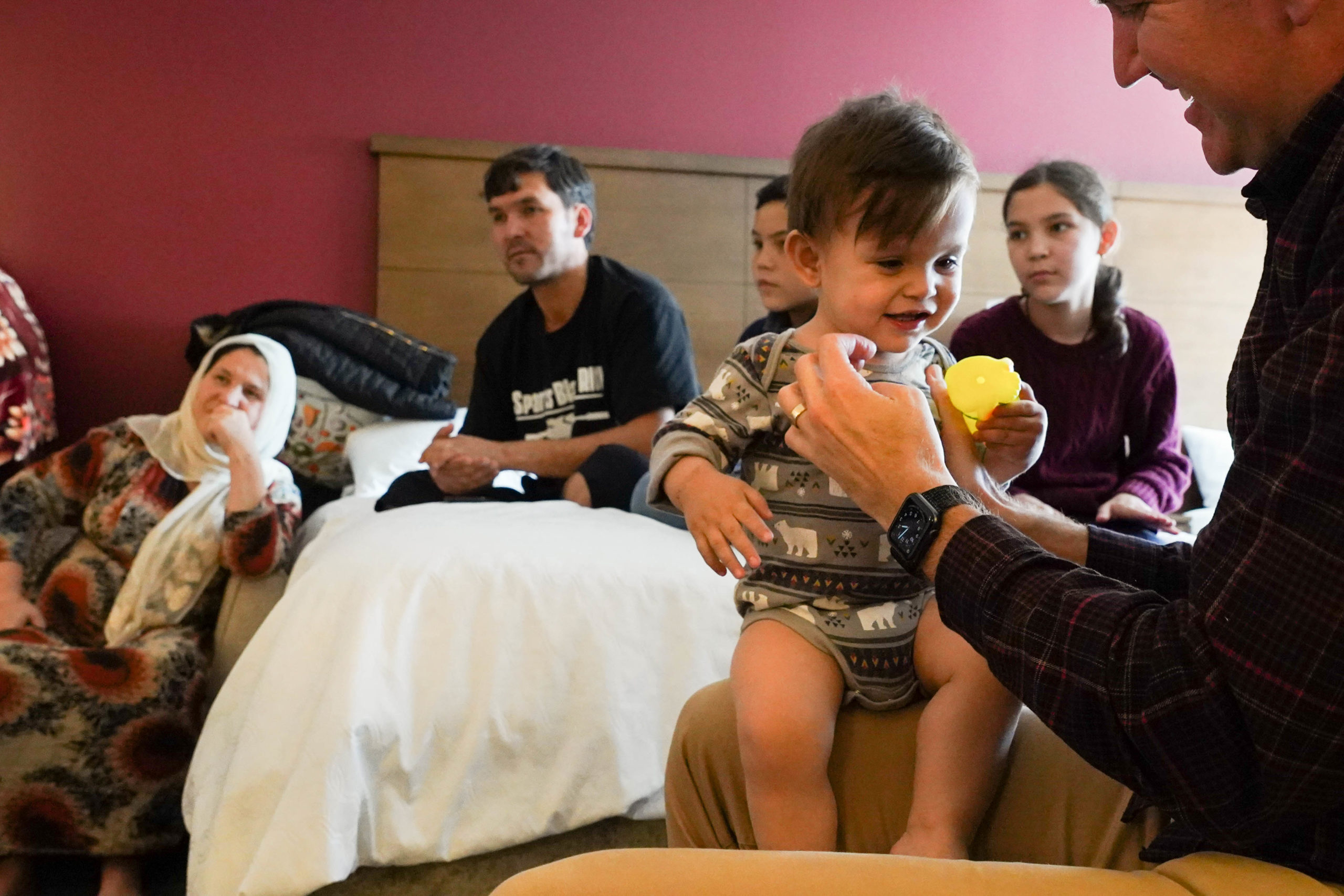 Utah residents step up to serve refugees like this newly arrived Afghan family...